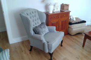 New bespoke chair in soft grey pinstripe. from project Sofa Upholstery, Bespoke Chair